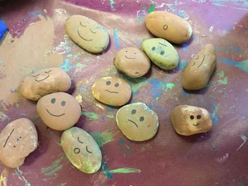 stones painted with expressions